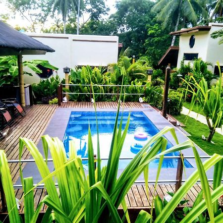 Siargao Sunset Bay Beach Villas Хенерал Луна Екстериор снимка